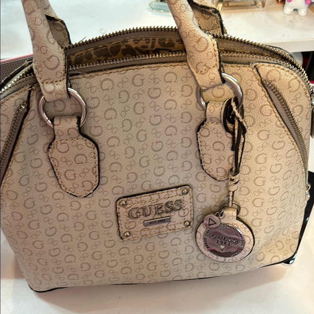 Guess Cream Satchel with Logo Charm